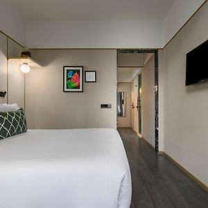 Kamer met een Queen Size Bed